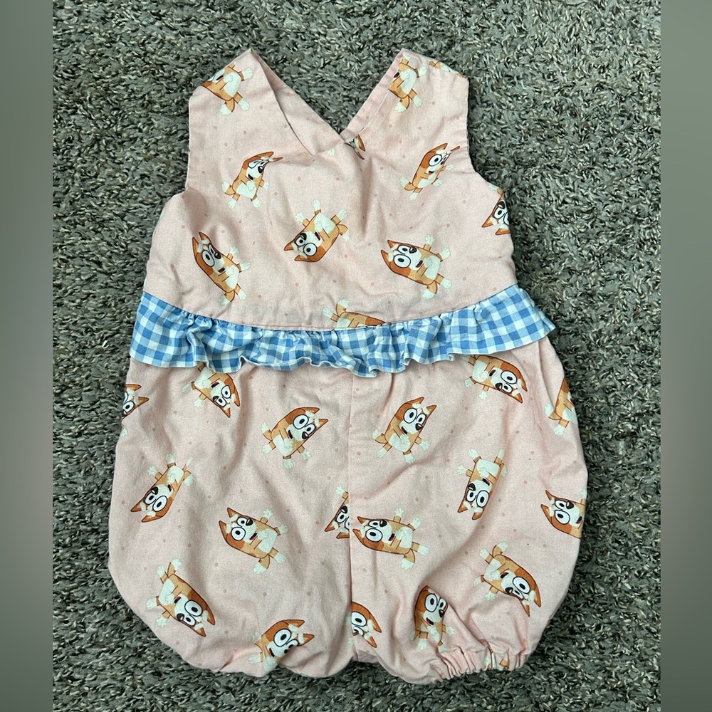 Light Pink Bubble Romper with Cartoon Bingo Bluey Print and Blue Checkered Waist
